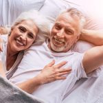 Glowing Older Couple in Bed